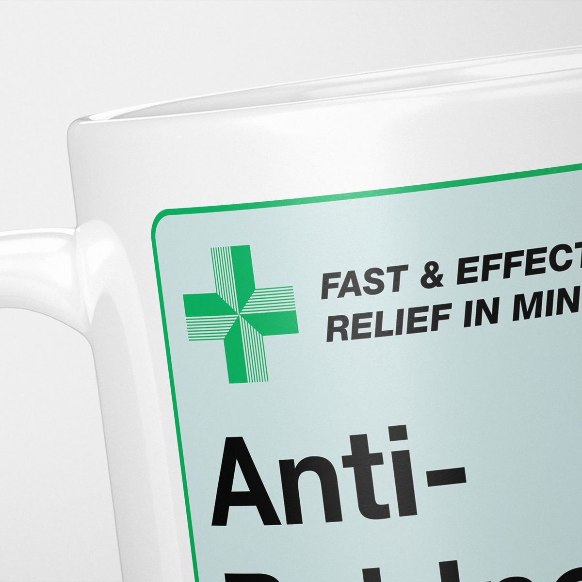 Close crop of the Anti-Baldness Medication label, the green cross and 'fast and effective relief in minutes' above the name