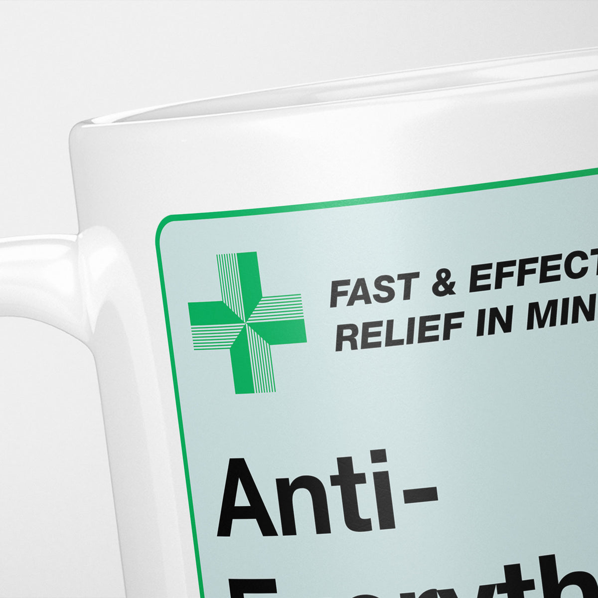 Close crop of the Anti-Everything Medication label, the green cross and 'fast and effective relief in minutes' above the name