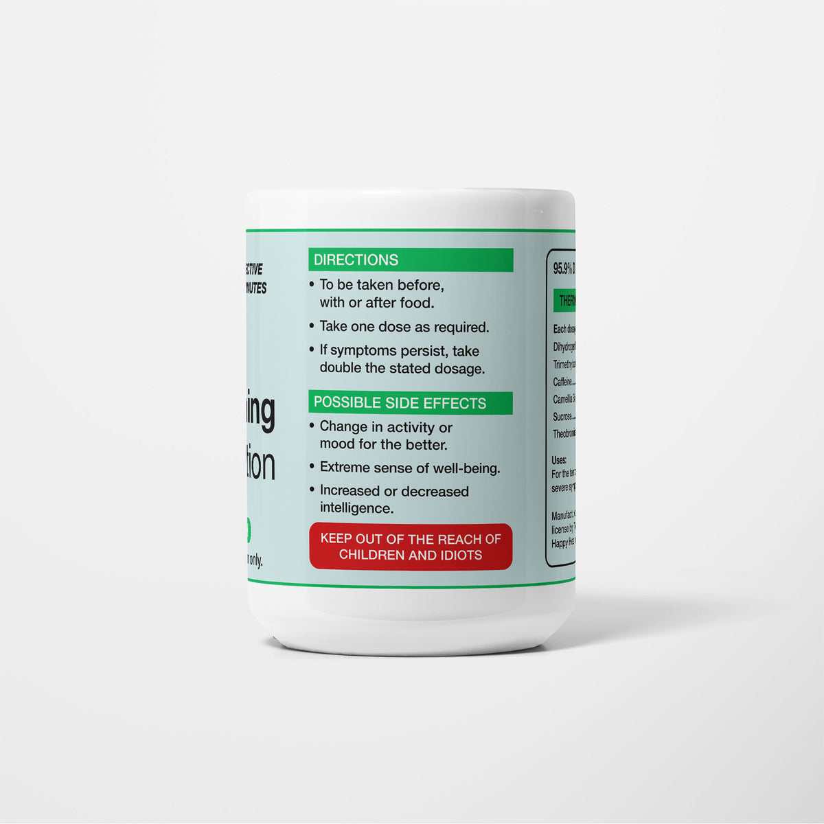 Reverse of the 15oz Anti-Everything Medication mug: directions to take one dose as required and double it if symptoms persist, side effects including an extreme sense of well-being, and a red panel reading keep out of the reach of children and idiots