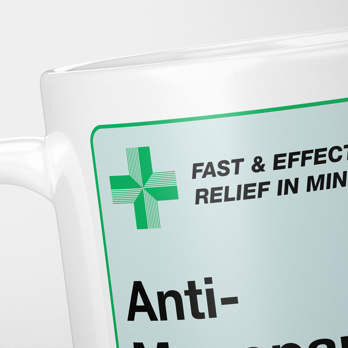 Close crop of the Anti-Menopause Medication label, the green cross and 'fast and effective relief in minutes' above the name