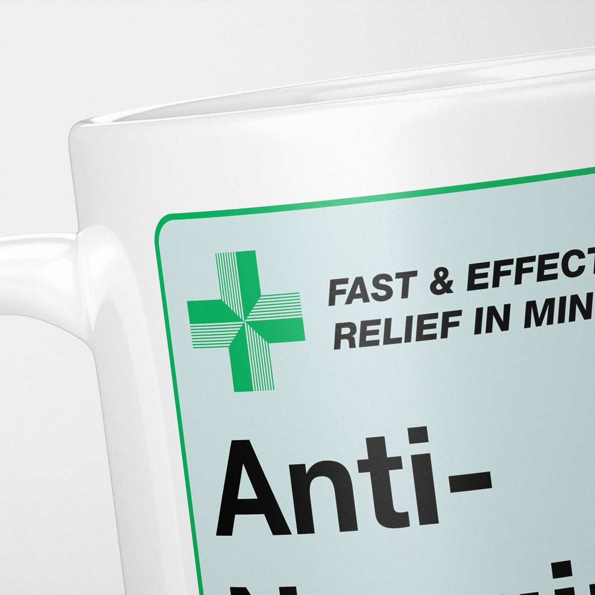 Close crop of the Anti-Nagging Medication label, the green cross and 'fast and effective relief in minutes' above the name