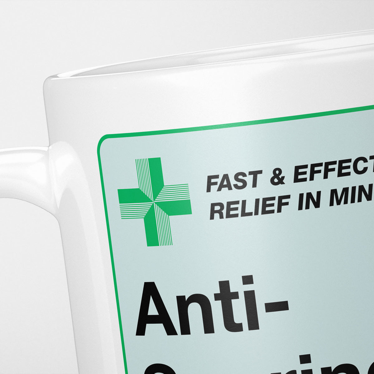 Close crop of the Anti-Snoring Medication label, the green cross and 'fast and effective relief in minutes' above the name