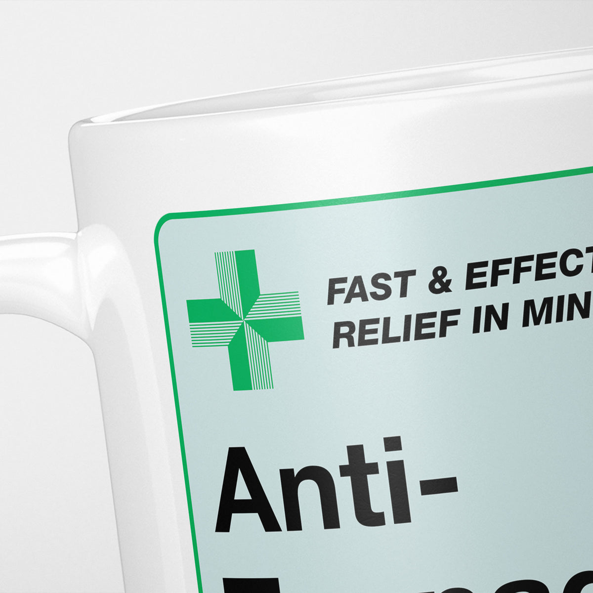 Close crop of the Anti-Teenager Medication label, the green cross and 'fast and effective relief in minutes' above the name