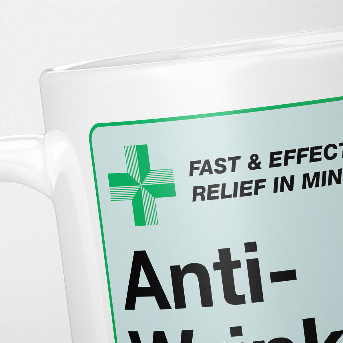 Close crop of the Anti-Wrinkle Medication label, the green cross and 'fast and effective relief in minutes' above the name