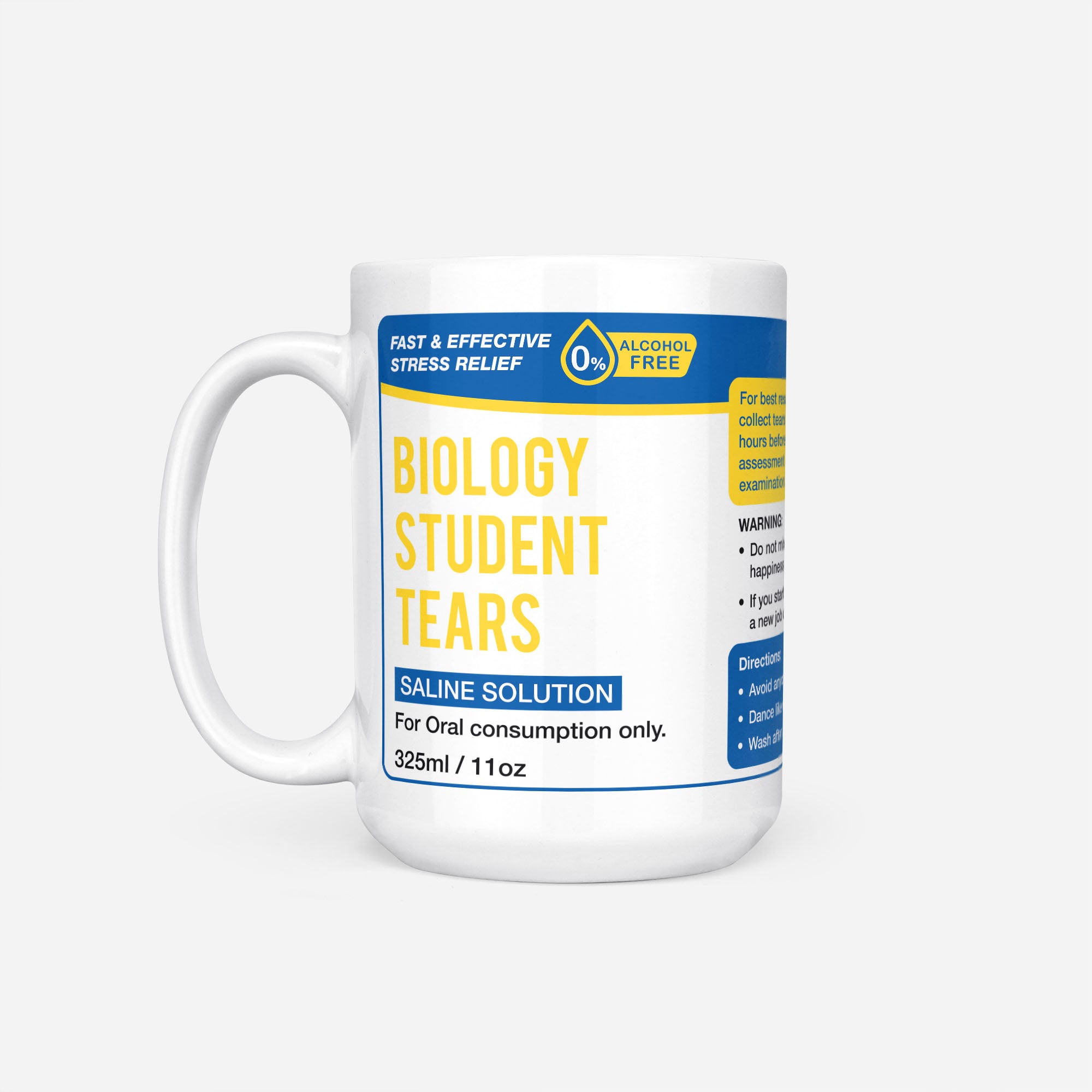 The 15oz Biology Student Tears mug, white ceramic with a blue pharmacy-style label reading 'Biology Student Tears — Saline Solution, for oral consumption only'