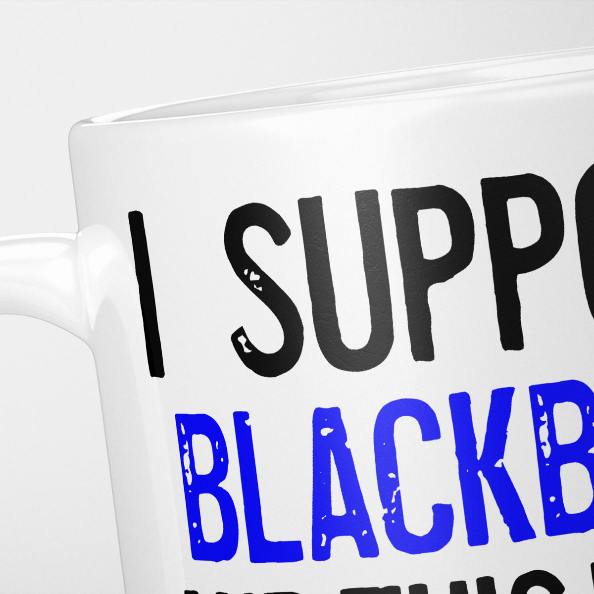 Close crop of the I Support Blackburn mug, 'I Support' in heavy black above the club name in blue, running off the edge of the frame