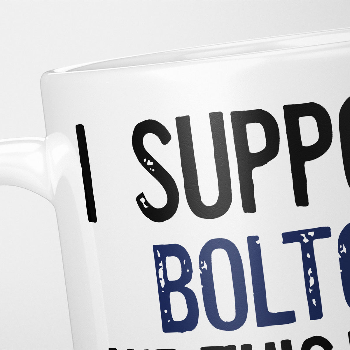 Close crop of the I Support Bolton mug, 'I Support' in heavy black above the club name in navy, running off the edge of the frame