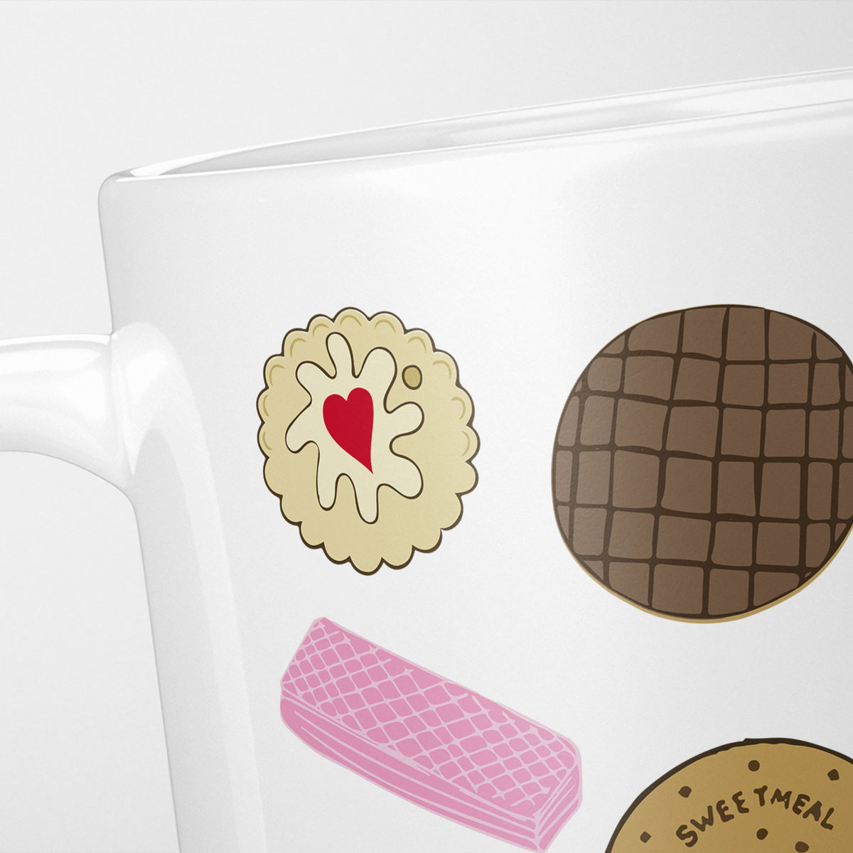 Close crop of the British Biscuits Illustration mug, a jammie dodger, a bourbon, a pink wafer and a sweetmeal biscuit