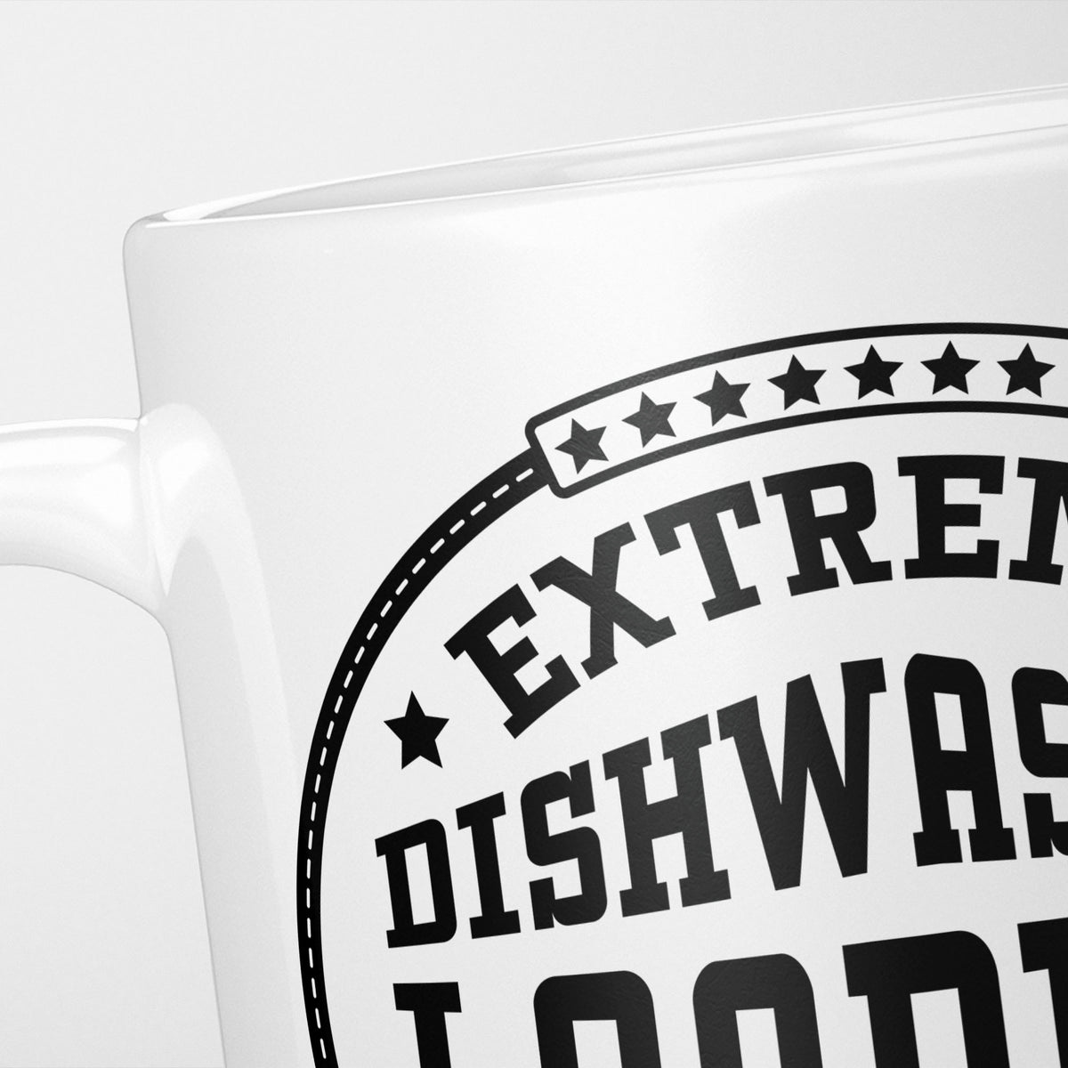 Close crop of the Extreme Dishwasher Loading Champion mug, the starred black badge and its lettering