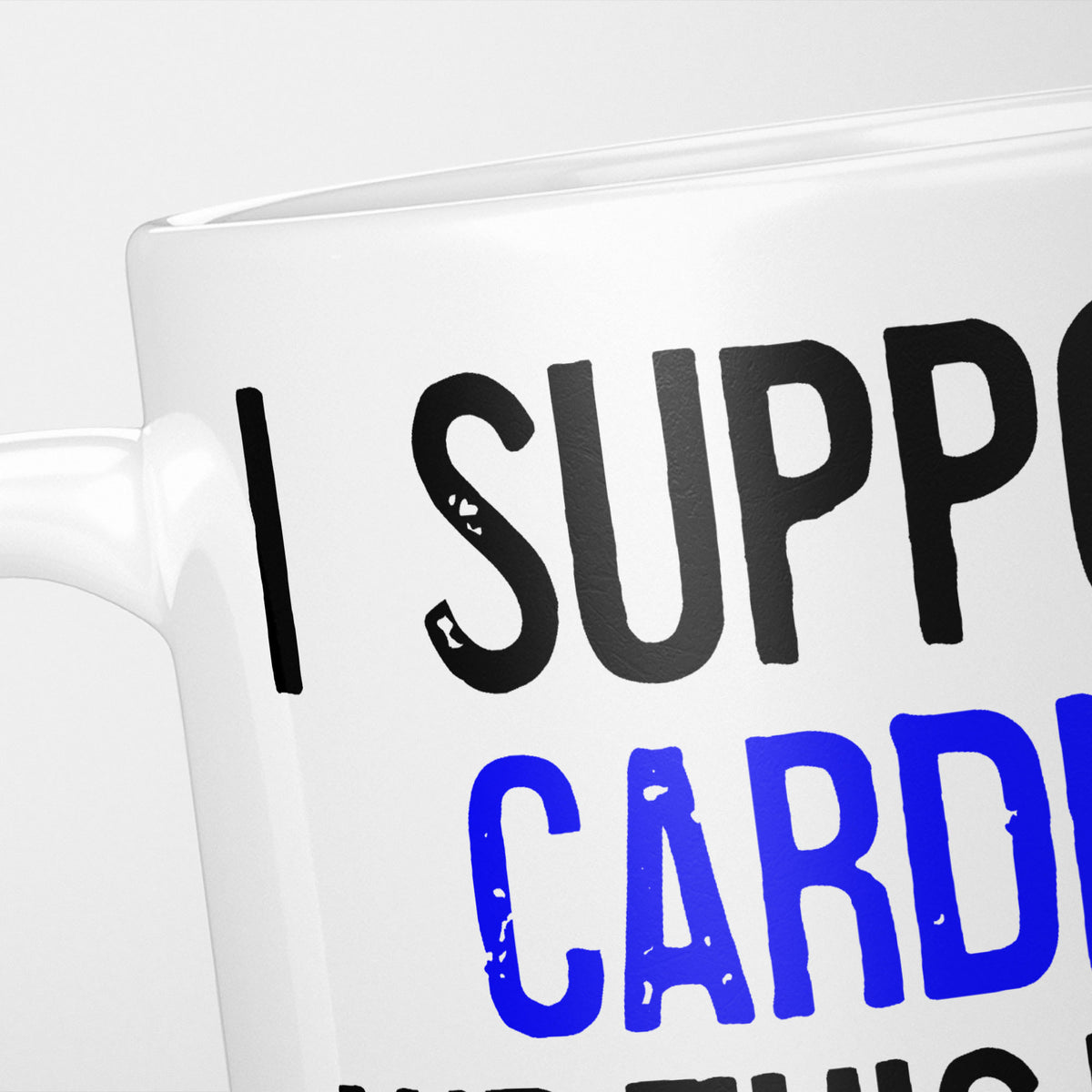 Close crop of the I Support Cardiff mug, 'I Support' in heavy black above the club name in blue, running off the edge of the frame