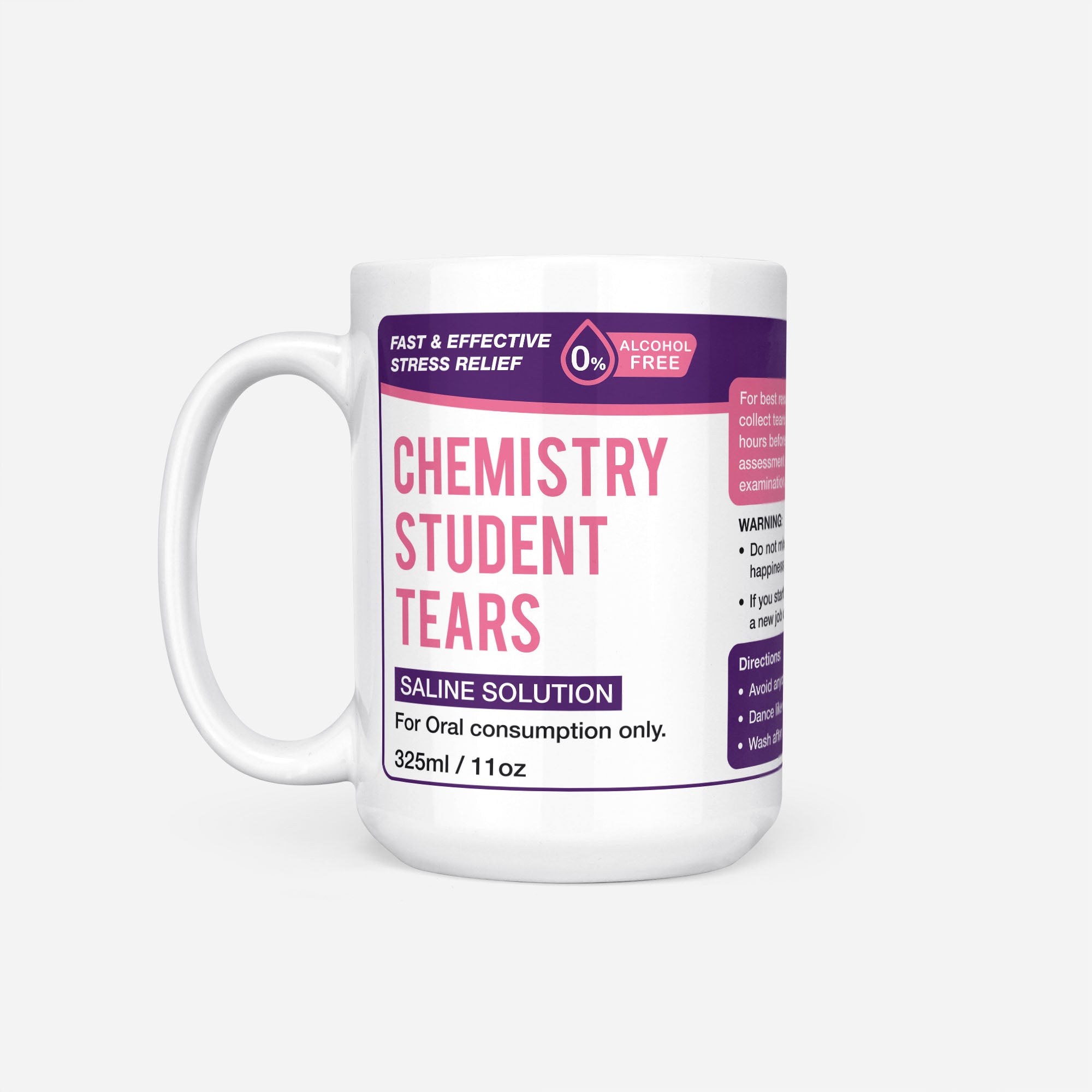 The 15oz Chemistry Student Tears mug, white ceramic with a purple pharmacy-style label reading 'Chemistry Student Tears — Saline Solution, for oral consumption only'