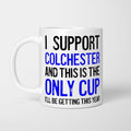 White ceramic mug with black and red text reading 'I Support Colchester and This is the Only Cup I'll Be Getting This Year'