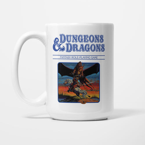 The 15oz Dungeons & Dragons Blue Box mug, white ceramic with the Dungeons & Dragons logo above vintage box artwork of a figure in a rocky landscape, in a blue colourway
