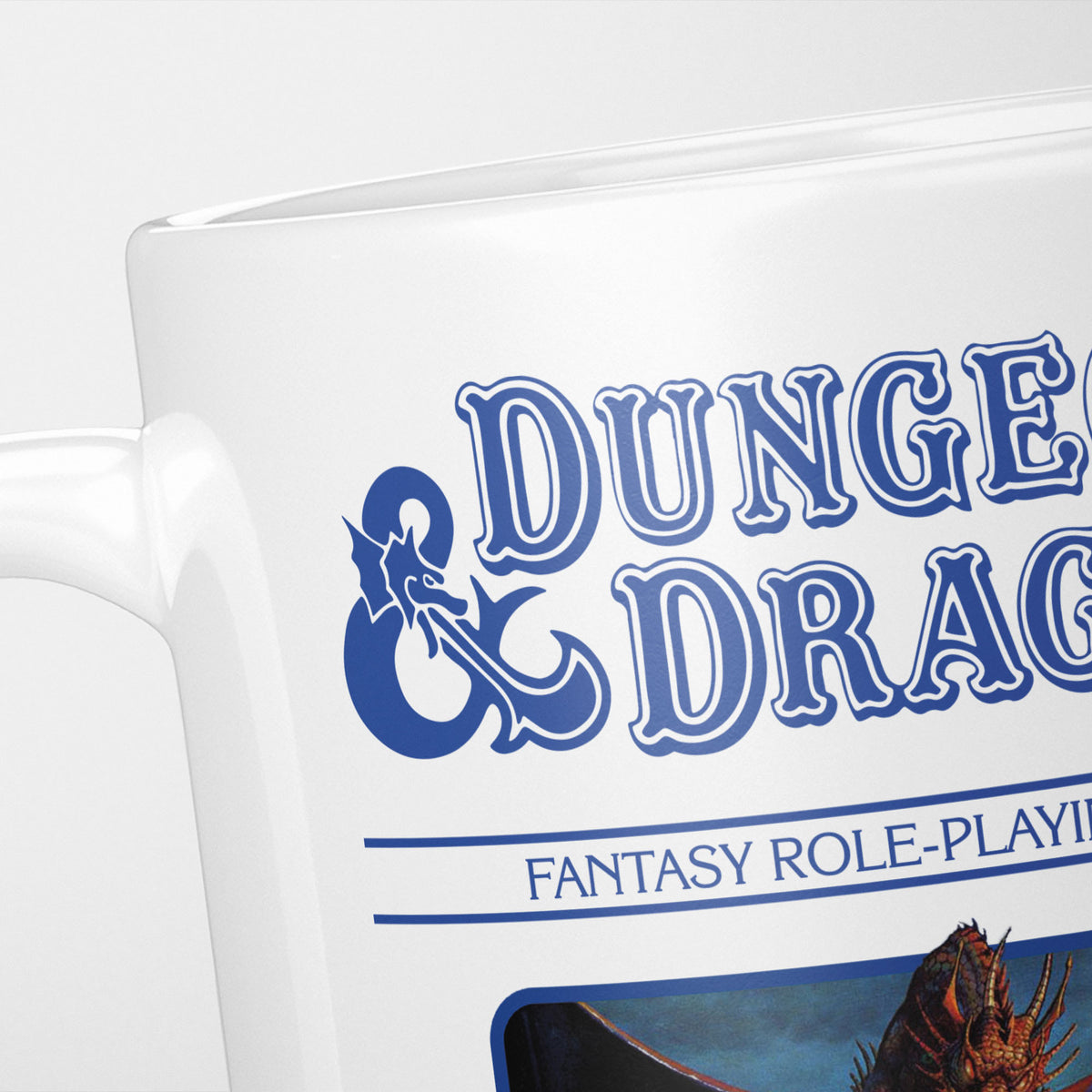Close crop of the Dungeons & Dragons Blue Box mug, the ornate logo and 'fantasy role-playing game' above the box artwork