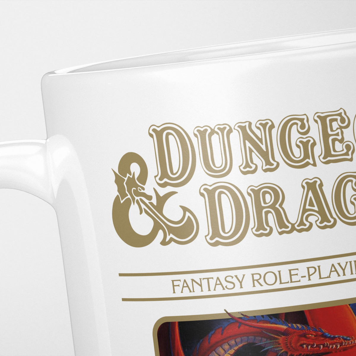 Close crop of the Dungeons & Dragons Gold Box mug, the ornate logo and 'fantasy role-playing game' above the box artwork