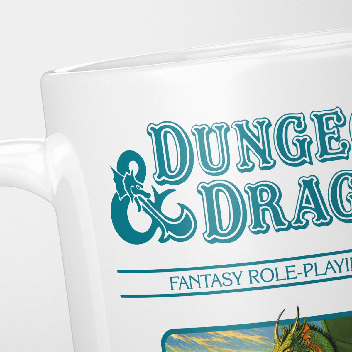 Close crop of the Dungeons & Dragons Teal Box mug, the ornate logo and 'fantasy role-playing game' above the box artwork