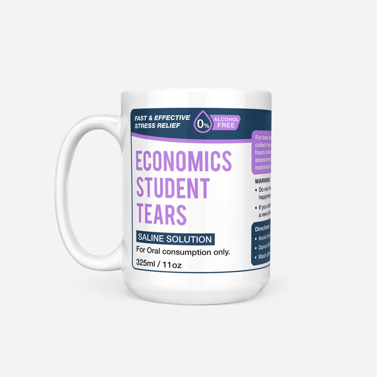 The 15oz Economics Student Tears mug, white ceramic with a navy pharmacy-style label reading 'Economics Student Tears — Saline Solution, for oral consumption only'