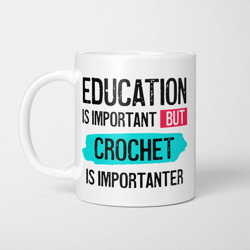 White ceramic mug with bold colourful text reading 'Education is Important but Crochet is Importanter'
