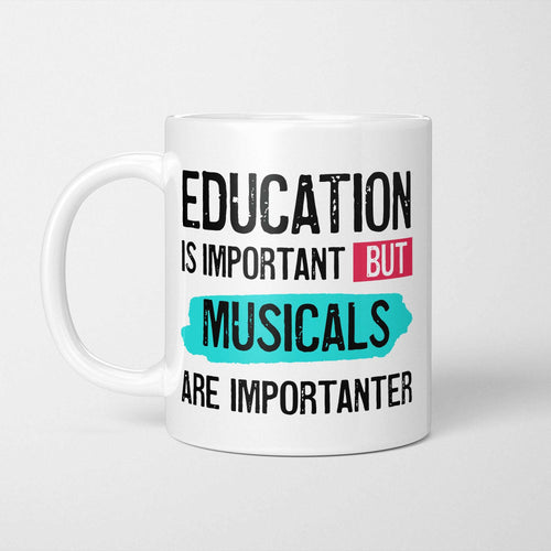 White ceramic mug with bold colourful text reading 'Education is Important but Musicals are Importanter'