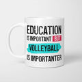 White ceramic mug with bold colourful text reading 'Education is Important but Volleyball is Importanter'