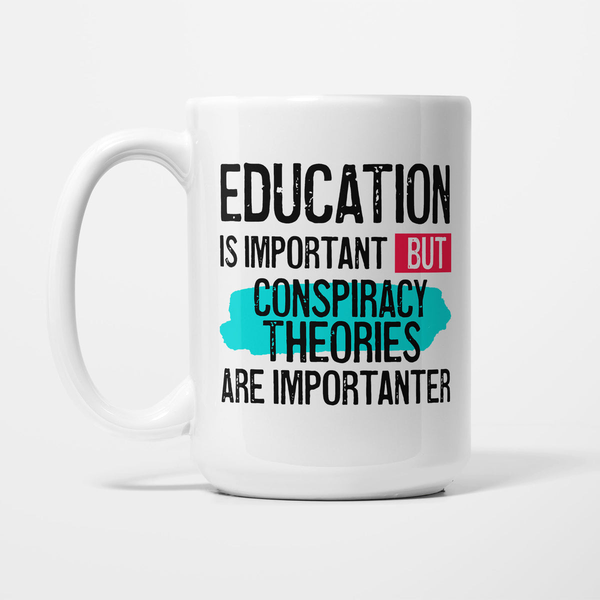 Education is Important but Conspiracy Theories are Importanter printed on a white 15oz/425ml mug