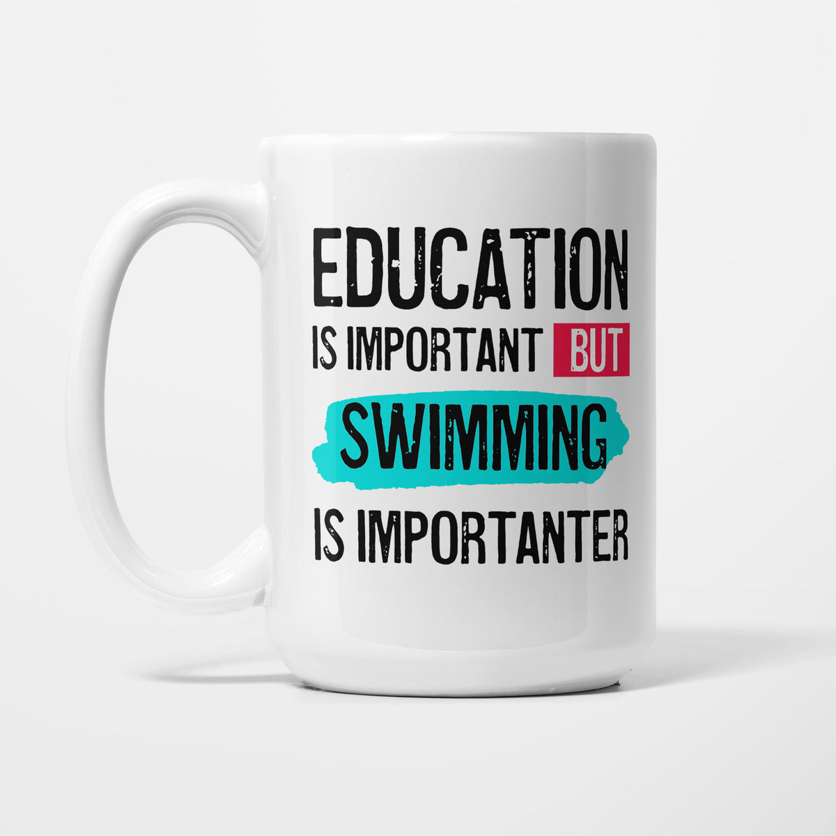 Education is Important but Swimming Is Importanter printed on a white 15oz/425ml mug