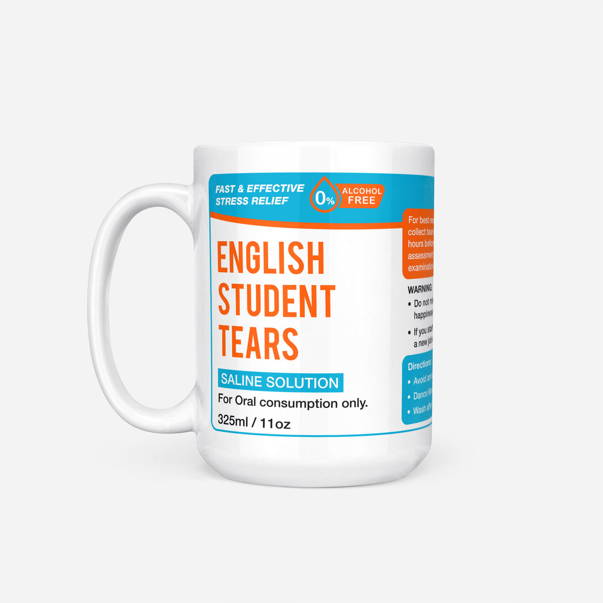 The 15oz English Student Tears mug, white ceramic with a turquoise pharmacy-style label reading 'English Student Tears — Saline Solution, for oral consumption only'