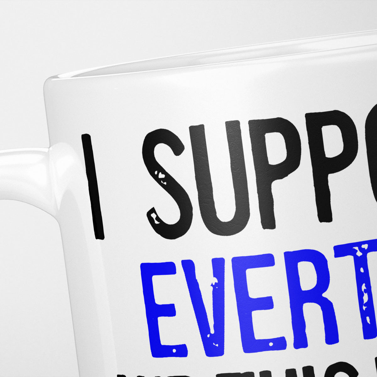 Close crop of the I Support Everton mug, 'I Support' in heavy black above the club name in blue, running off the edge of the frame