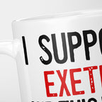 Close crop of the I Support Exeter mug, 'I Support' in heavy black above the club name in red, running off the edge of the frame