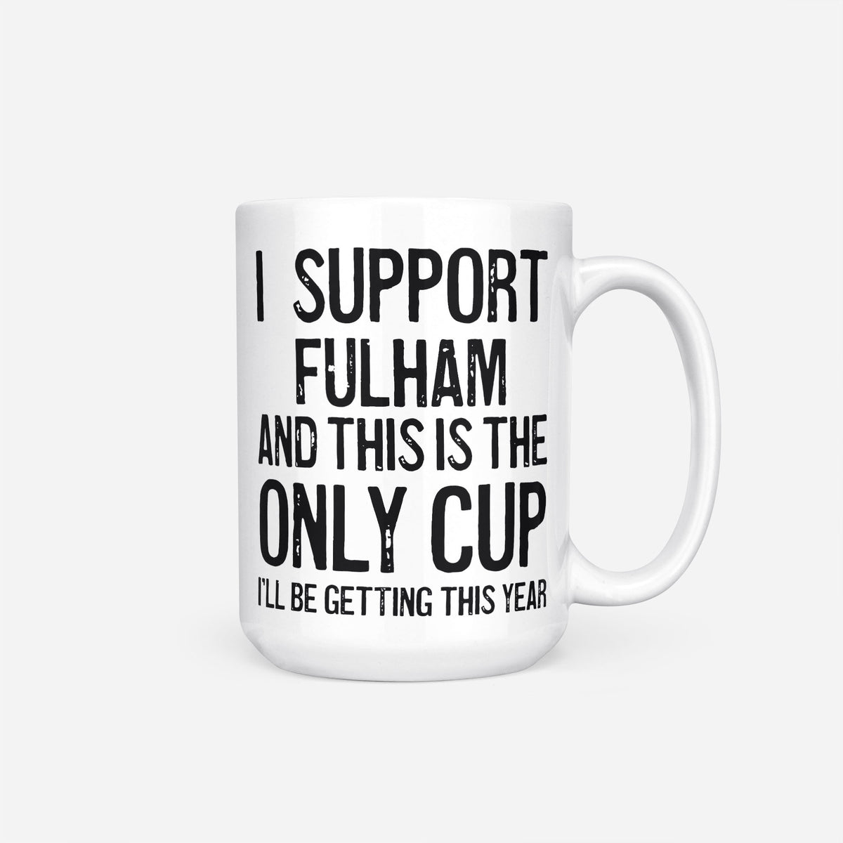 The 15oz I Support Fulham mug, white ceramic reading 'I Support Fulham and This is the Only Cup I'll Be Getting This Year', the whole design in heavy black type