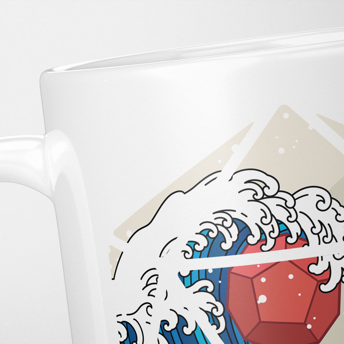 Close crop of the Great Wave D20 mug, the blue and white wave curling inside the facets of the twenty-sided die