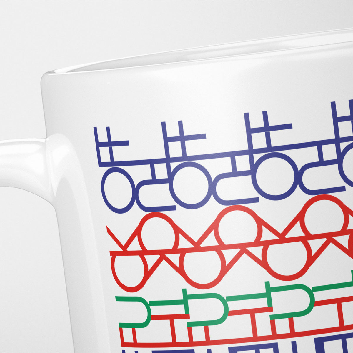 Close crop of the Funny Hidden Message "F*ck The F*ck Off" mug, rows of blue, red, orange and green interlocking letterforms