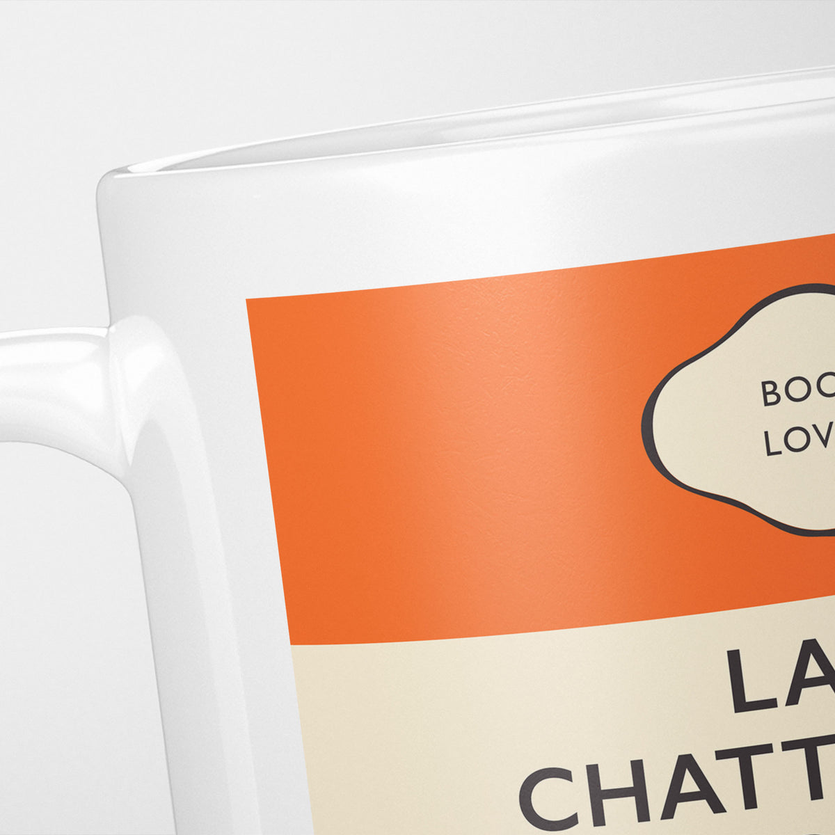 Close crop of the Lady Chatterley's Lover jacket, the orange band above the cream title panel, the lettering running off the frame