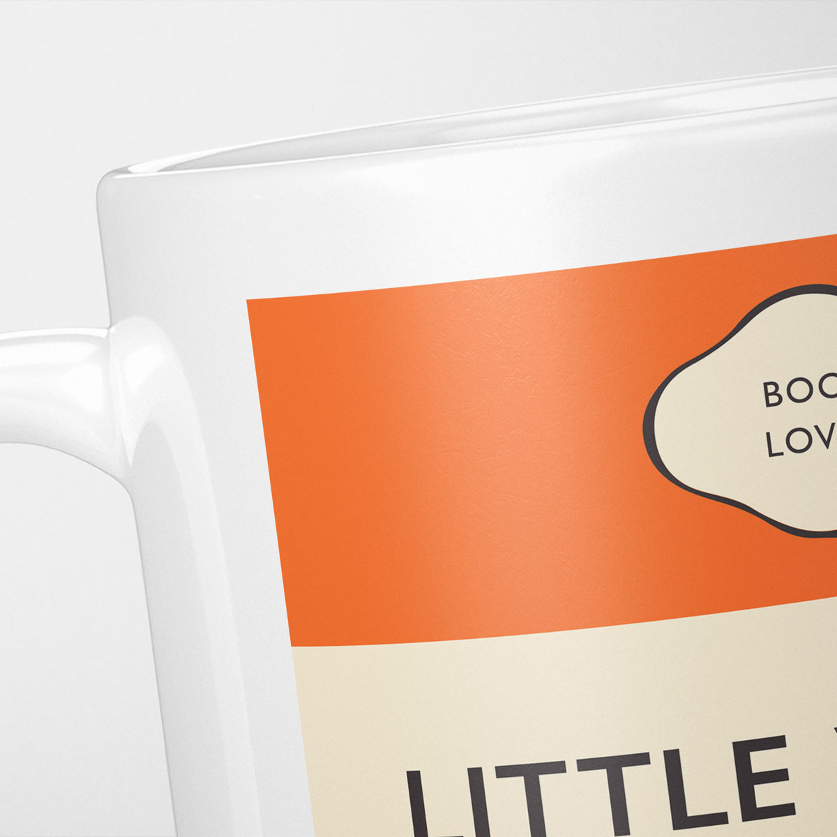 Close crop of the Little Women jacket, the orange band above the cream title panel, the lettering running off the frame