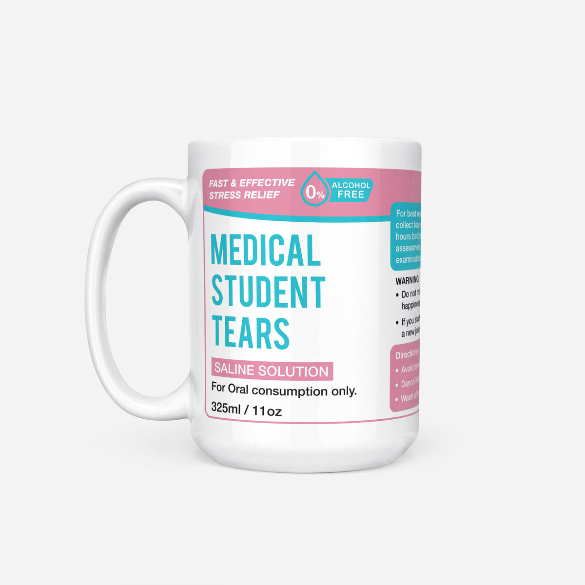 The 15oz Medical Student Tears mug, white ceramic with a pink pharmacy-style label reading 'Medical Student Tears — Saline Solution, for oral consumption only'
