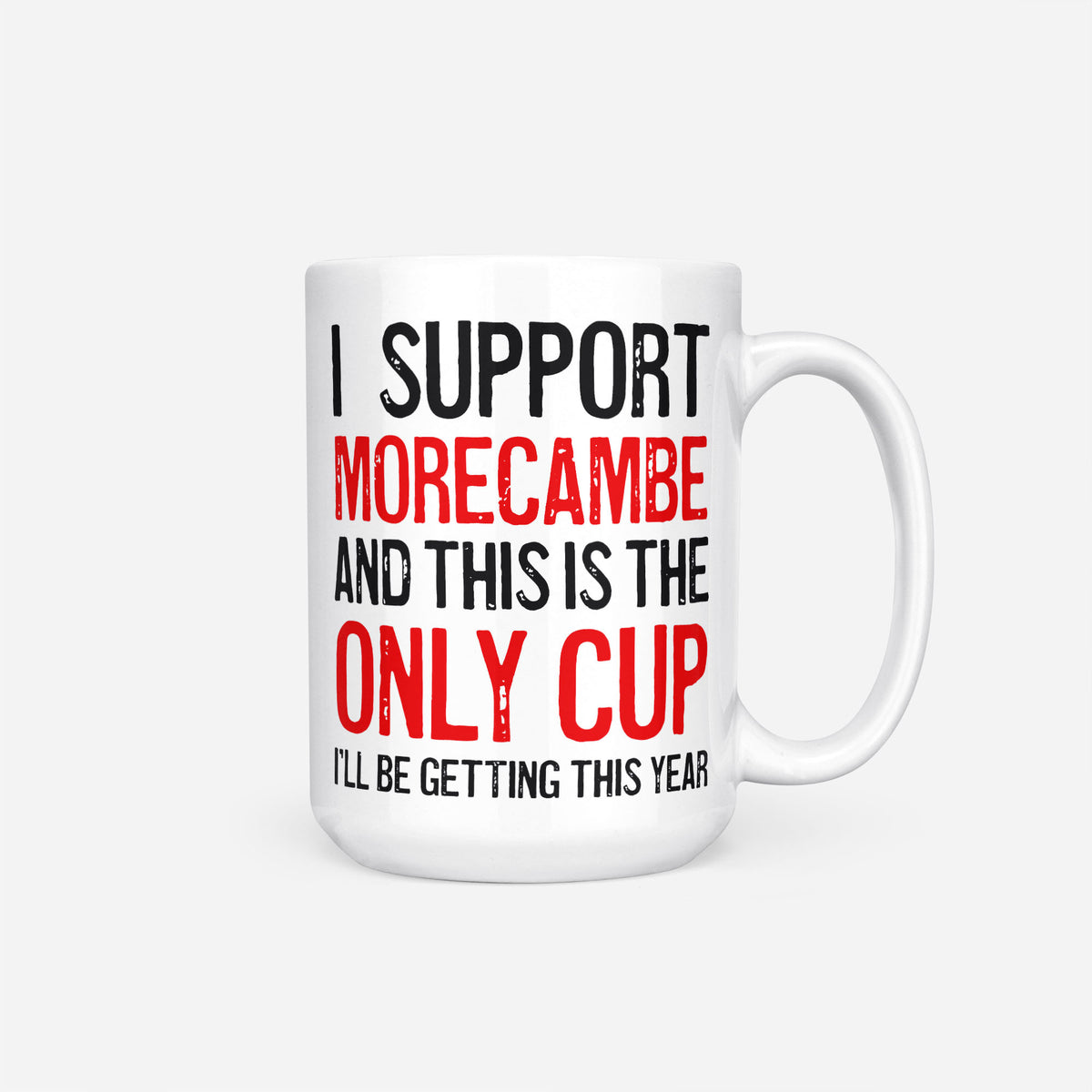 The 15oz I Support Morecambe mug, white ceramic reading 'I Support Morecambe and This is the Only Cup I'll Be Getting This Year', the club name and 'Only Cup' in red