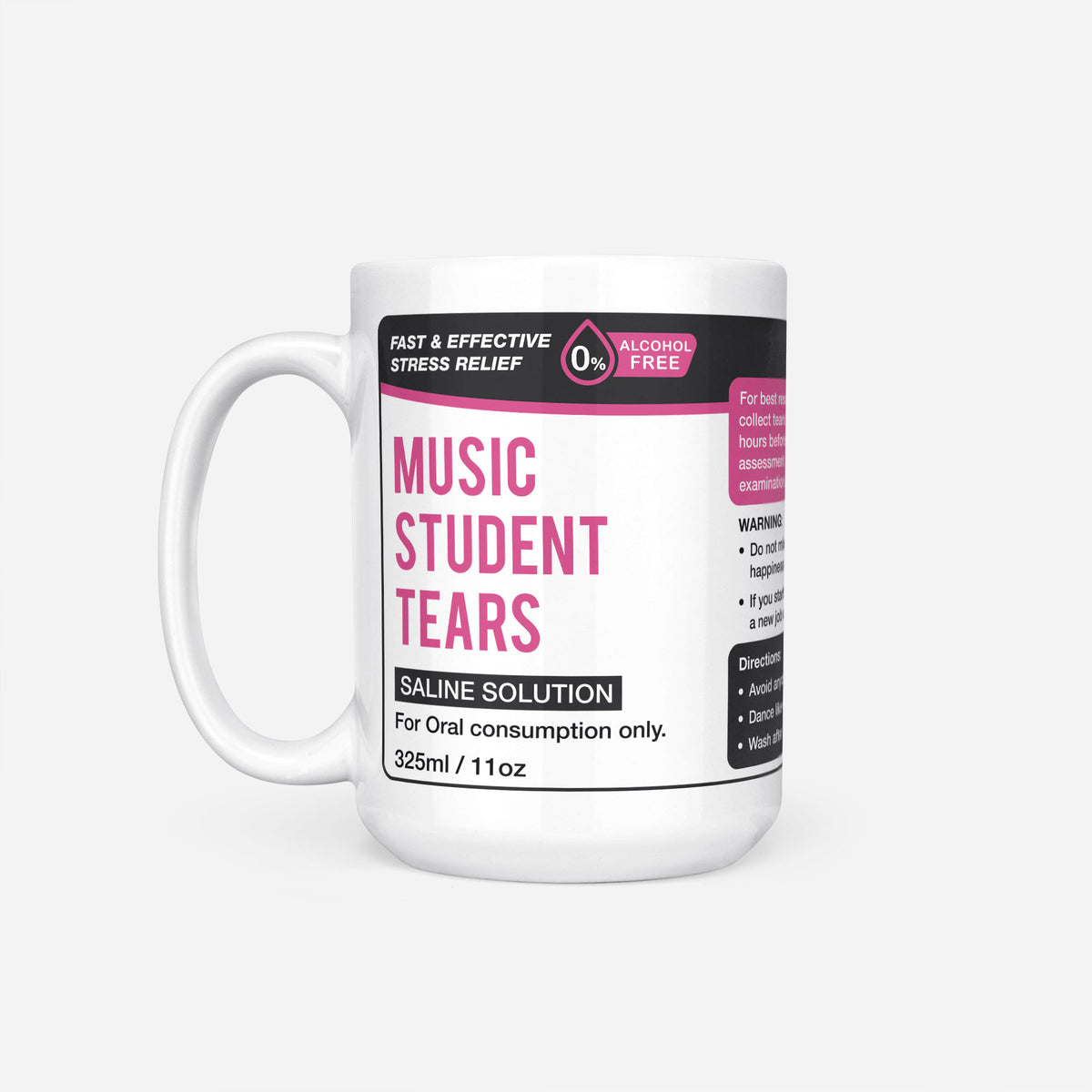 The 15oz Music Student Tears mug, white ceramic with a black pharmacy-style label reading 'Music Student Tears — Saline Solution, for oral consumption only'