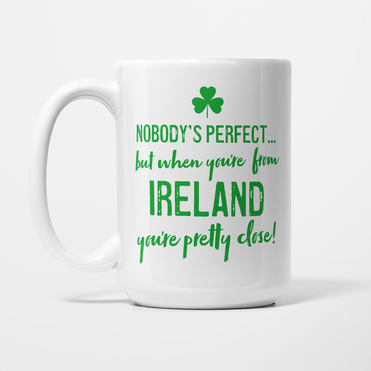 The 15oz Nobody's Perfect Ireland mug, white ceramic reading 'Nobody's perfect... but when you're from IRELAND you're pretty close!' in green lettering beneath a green shamrock