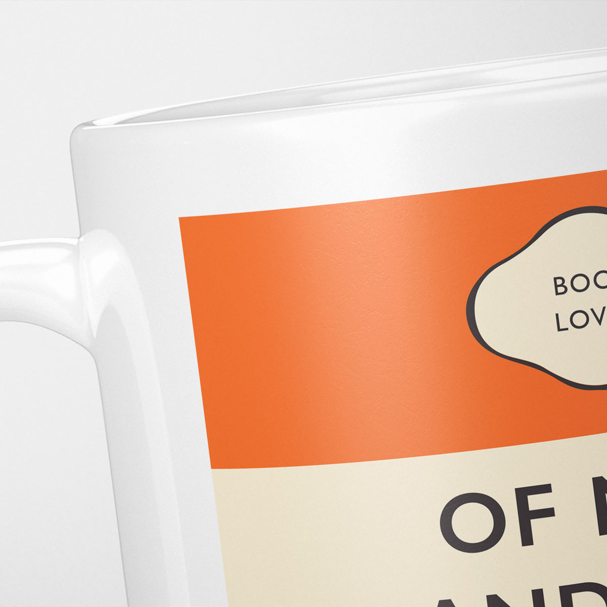 Close crop of the Of Mice and Men jacket, the orange band above the cream title panel, the lettering running off the frame