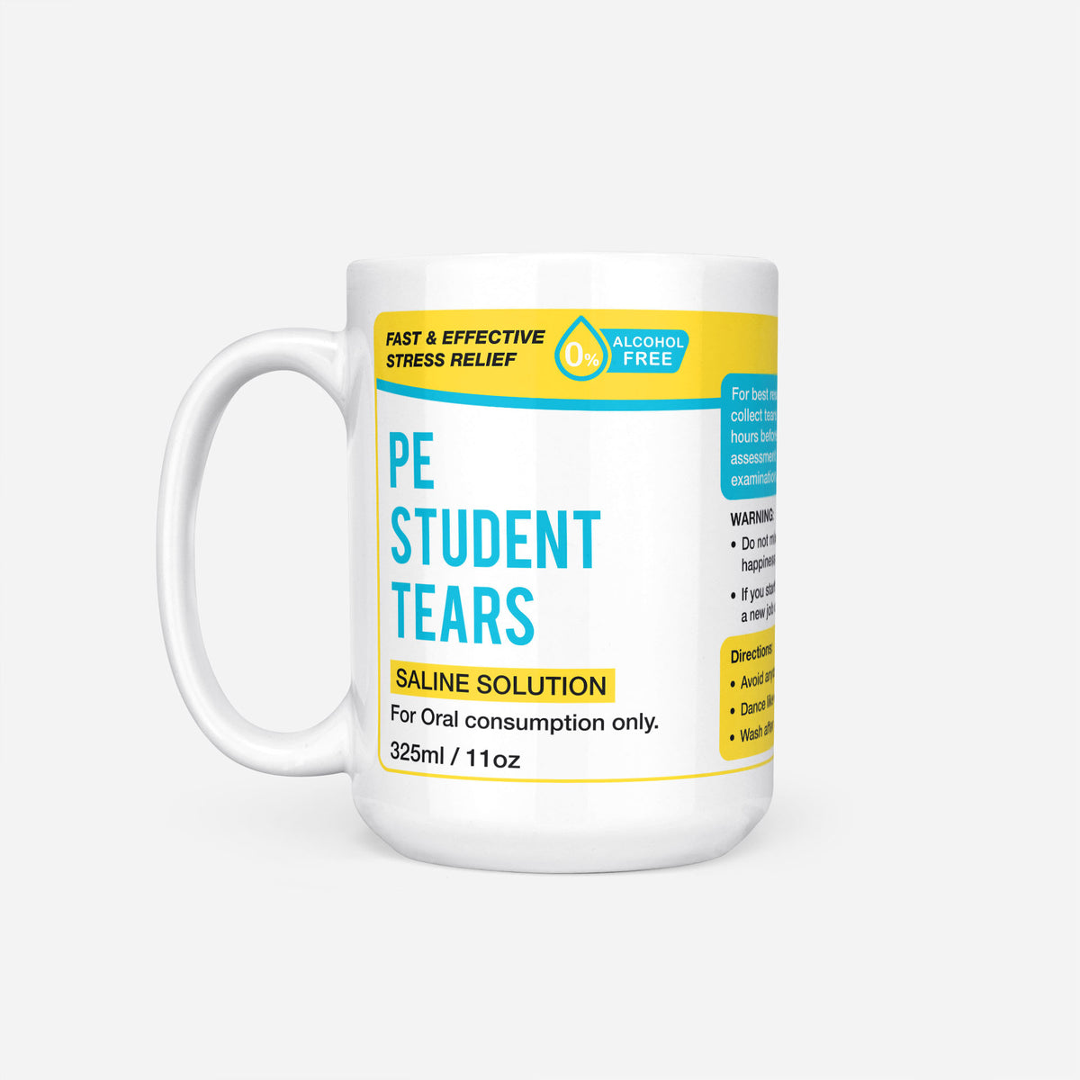 The 15oz PE Student Tears mug, white ceramic with a yellow pharmacy-style label reading 'PE Student Tears — Saline Solution, for oral consumption only'