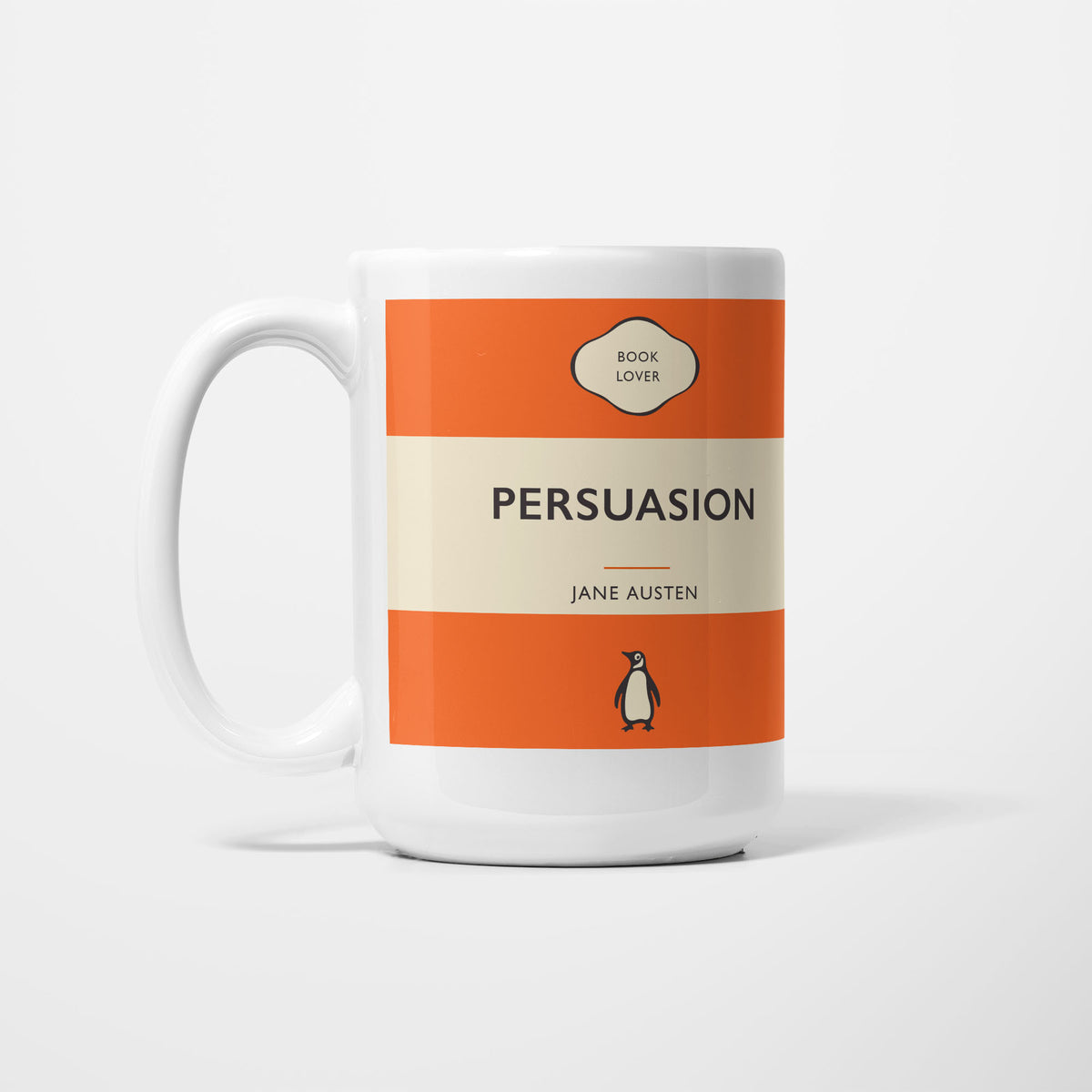 The 15oz Persuasion mug, white ceramic printed as a vintage paperback jacket in orange and cream, reading 'Persuasion' above Jane Austen