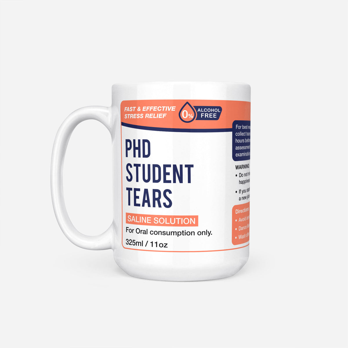 The 15oz PhD Student Tears mug, white ceramic with a navy pharmacy-style label reading 'PhD Student Tears — Saline Solution, for oral consumption only'
