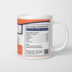 Side of the PhD Student Tears mug: ingredients panel listing 0.9% sodium chloride with despair, frustration, regret, fear and confusion