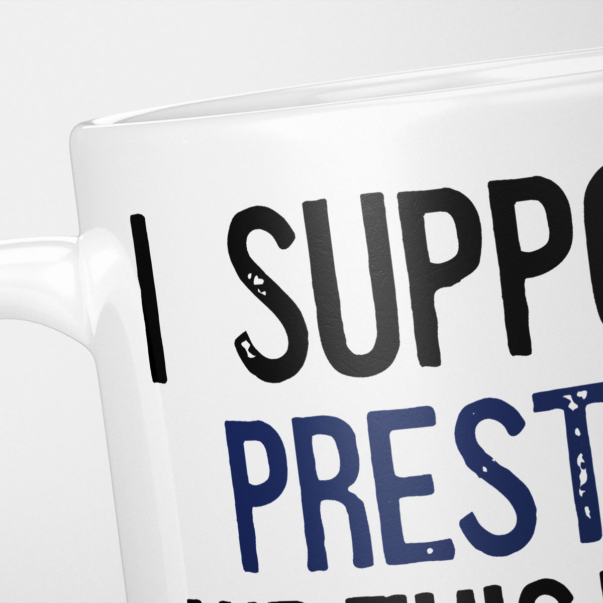 Close crop of the I Support Preston mug, 'I Support' in heavy black above the club name in navy, running off the edge of the frame