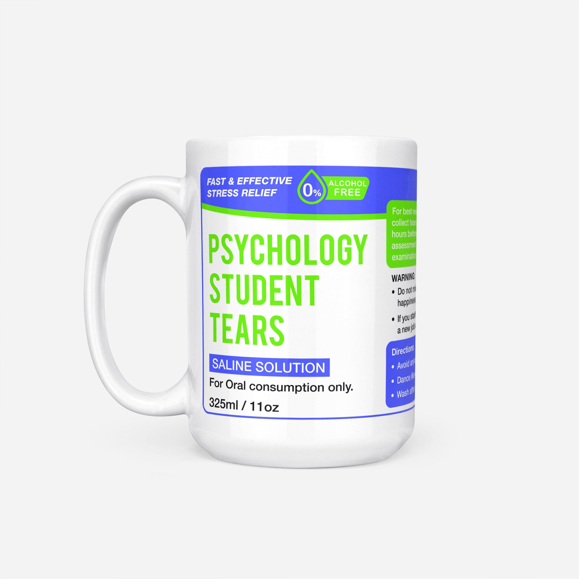 The 15oz Psychology Student Tears mug, white ceramic with a blue pharmacy-style label reading 'Psychology Student Tears — Saline Solution, for oral consumption only'