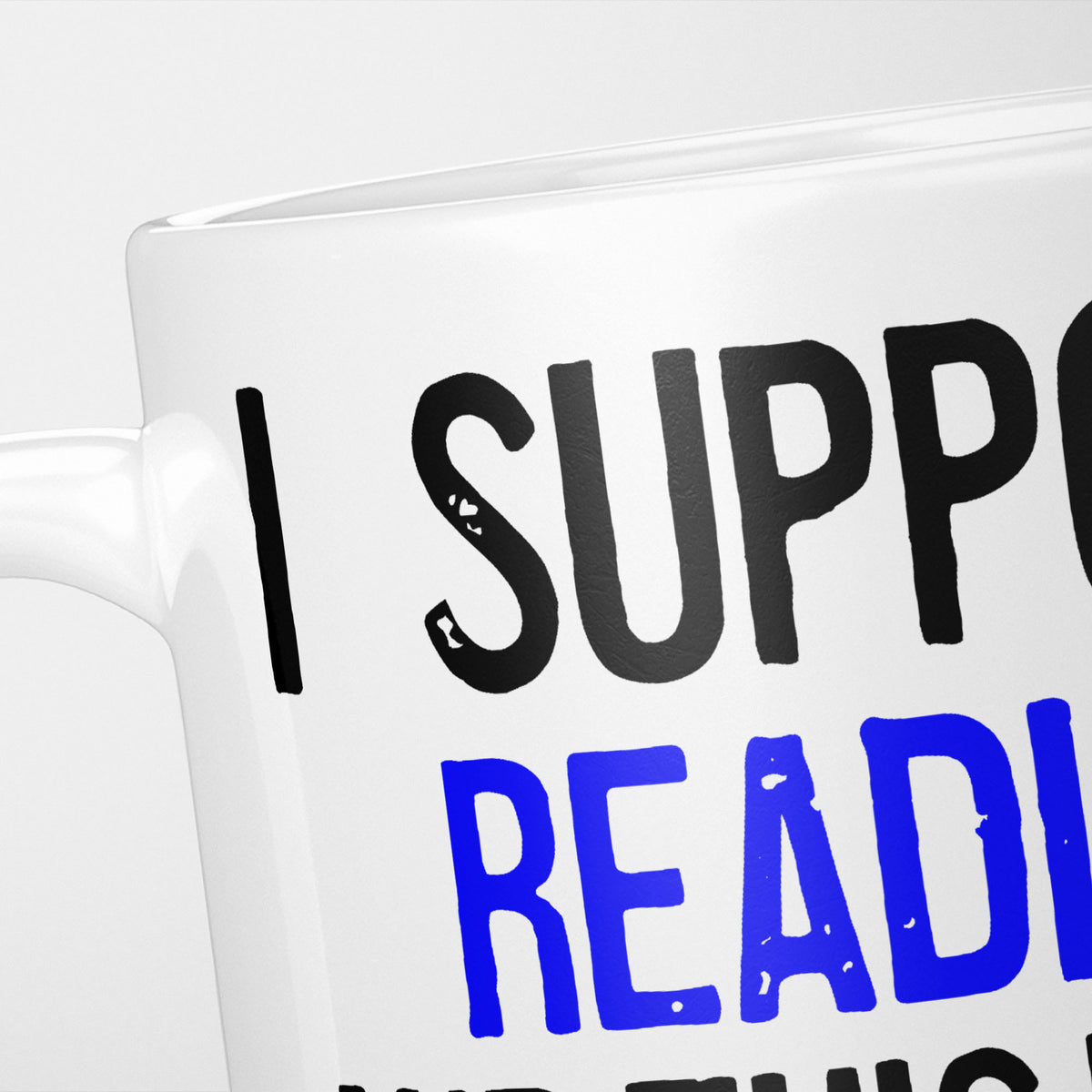 Close crop of the I Support Reading mug, 'I Support' in heavy black above the club name in blue, running off the edge of the frame