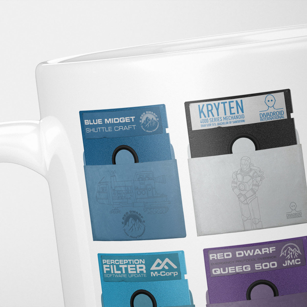 Close crop of the Red Dwarf Floppy Disks mug, two of the labelled disks filling the frame