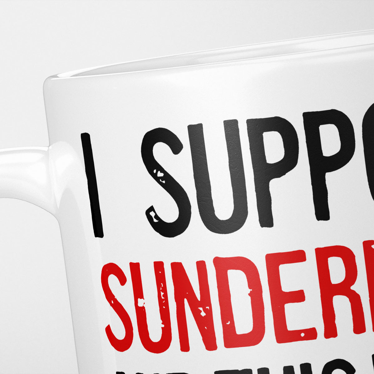 Close crop of the I Support Sunderland mug, 'I Support' in heavy black above the club name in red, running off the edge of the frame