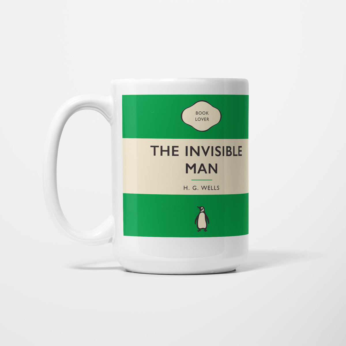 The 15oz Invisible Man mug, white ceramic printed as a vintage paperback jacket in green and cream, reading 'The Invisible Man' above H. G. Wells