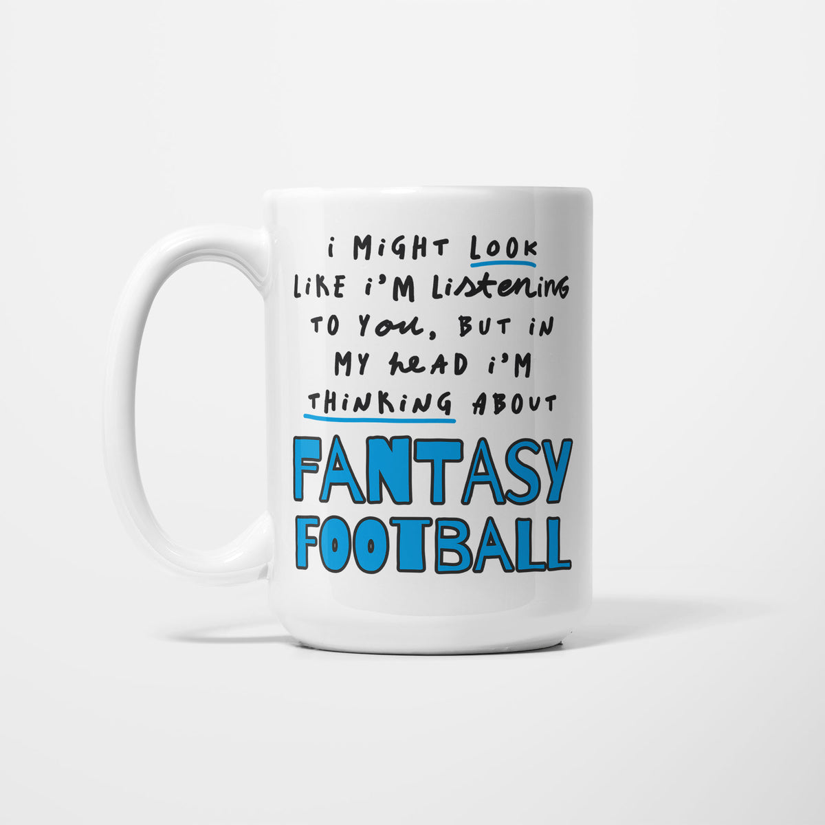 White 15oz ceramic mug, hand-lettered "I might look like I'm listening to you, but in my head I'm thinking about Fantasy Football" in bright blue outlined capitals with blue underlines